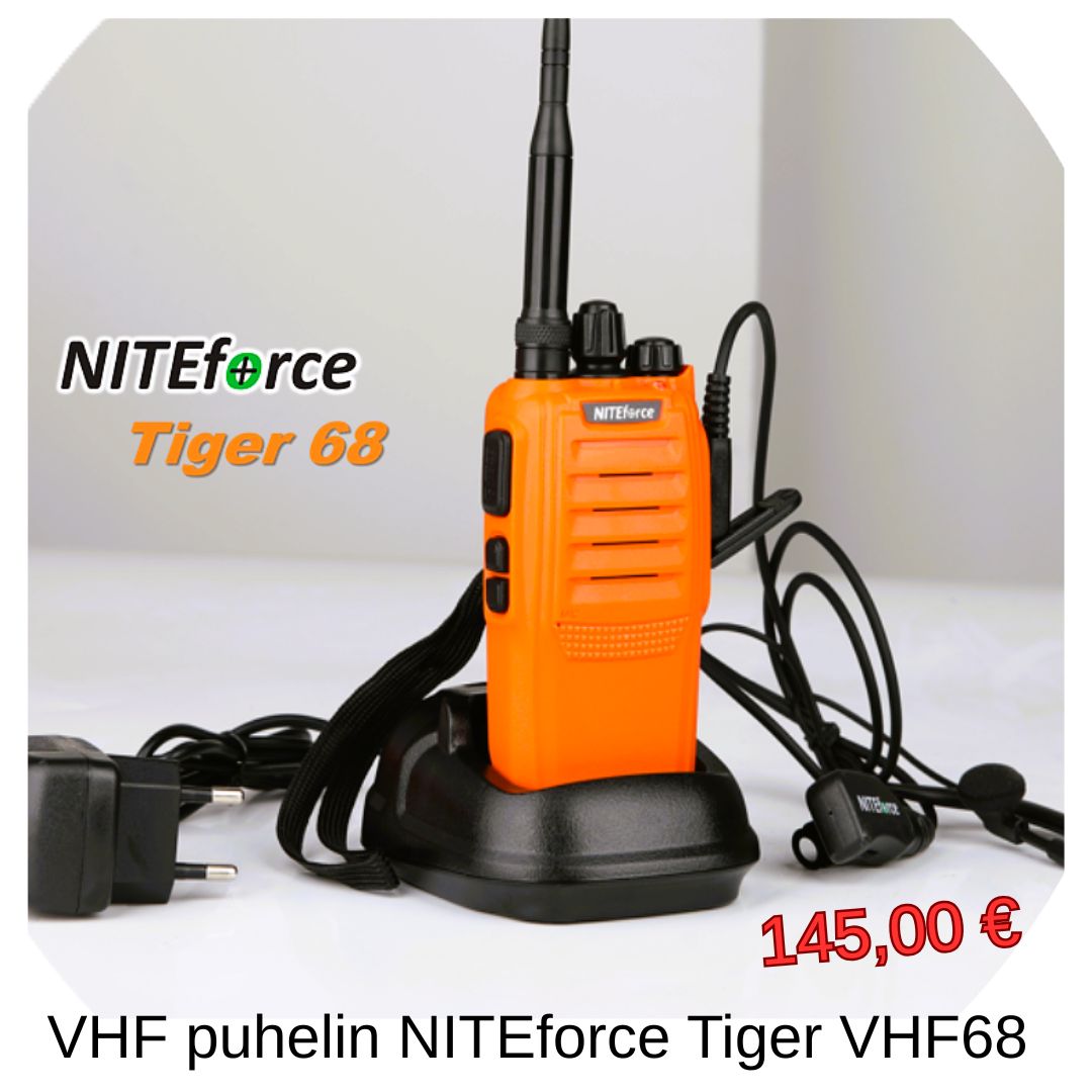 Orange NITEforce Tiger 68 VHF handheld radio in charging cradle with attached accessories and coiled cords; price shown 145,00 €.